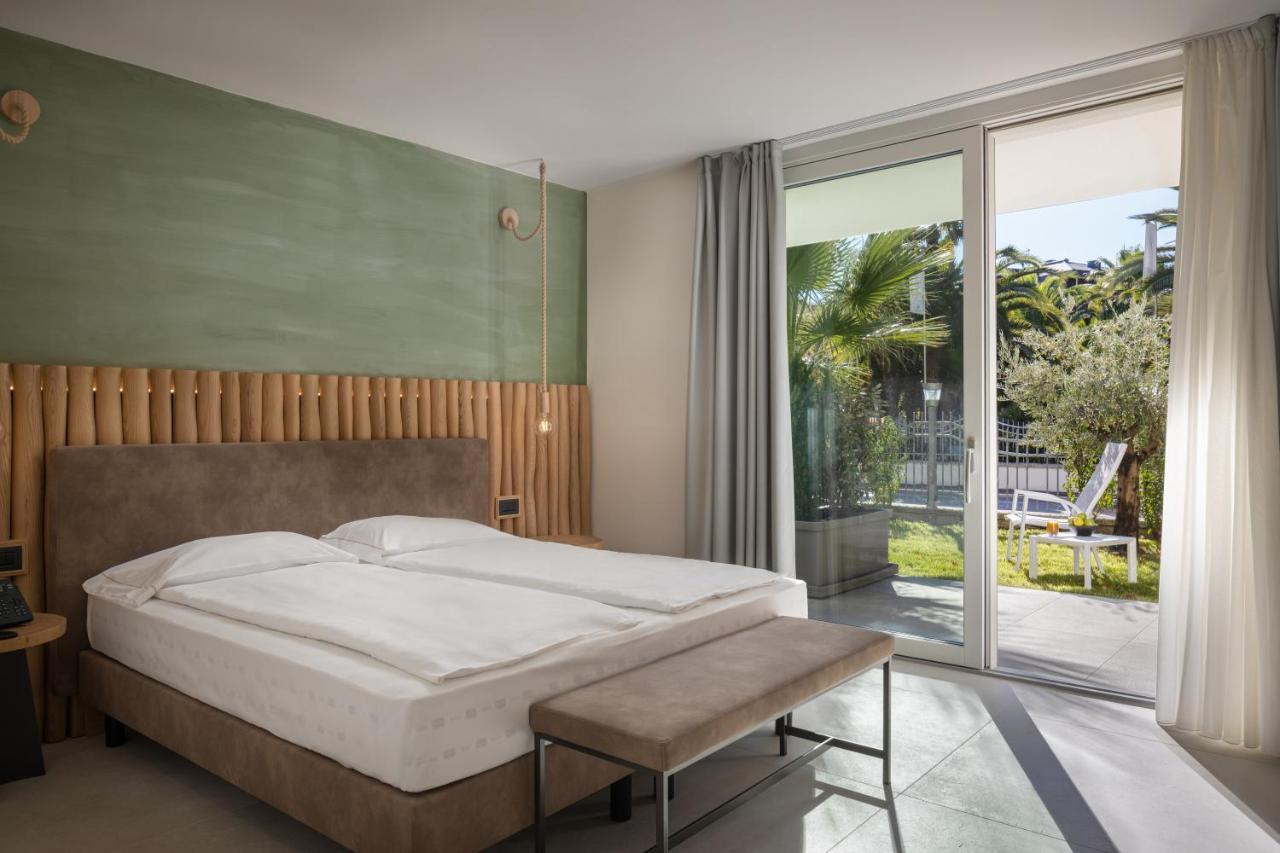 Aris Apartments & Sky Pool - Tonelli Hotels - Adult Friendly Рива-дель-Гарда Номер фото